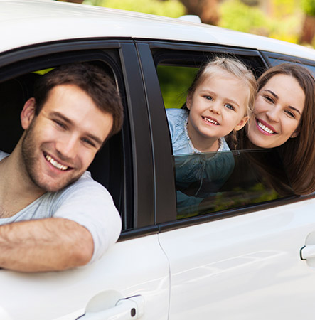 Family Looking Out Car Windows with Auto Insurance in Paso Robles, CA