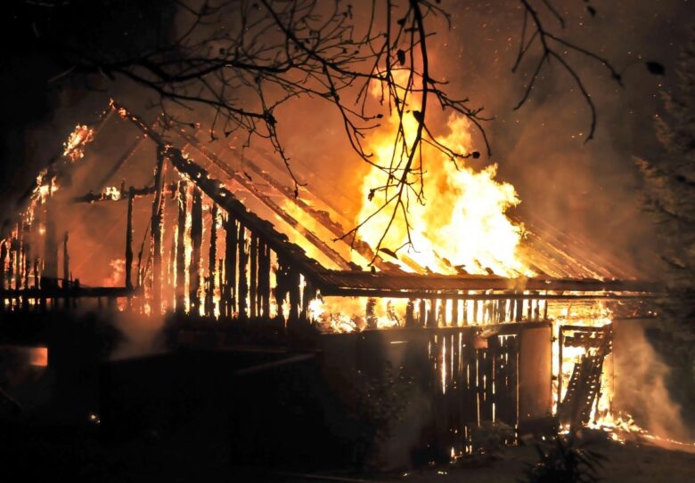 Burnt House with Flames Needing California Fair Plan Fire Insurance in Nipomo, CA