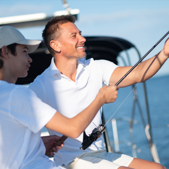 Father and Son After Obtaining Fishing Boat Insurance in San Luis Obispo, CS