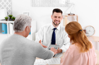 Life Insurance Agent in San Luis Obispo, CA Discussing a Policy with Clients